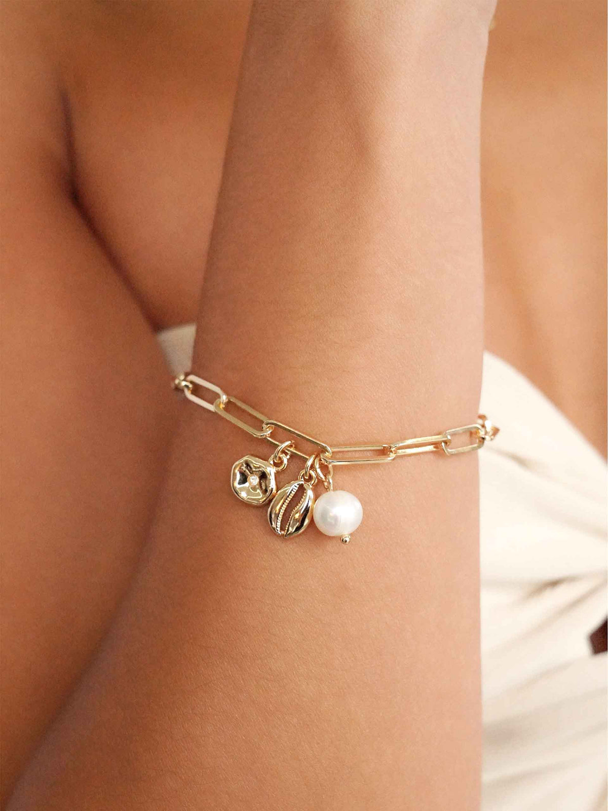 Golden Shore Charm Bracelet by Ettika | Beach Bunny Swimwear